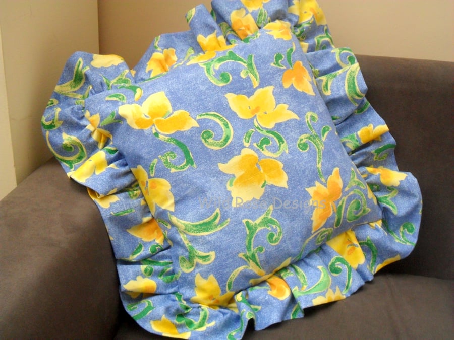 Frilled cushion in blue and yellow 