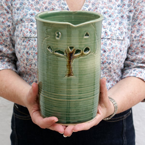 Green tree pottery flower vase - a tall stoneware vase glazed in forest green
