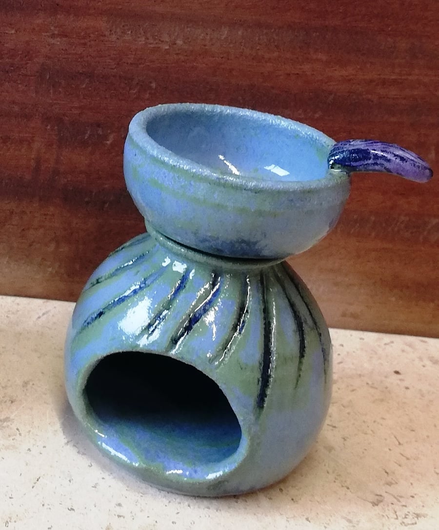 A delightful selection of hand made, unique, ceramic oil burners.