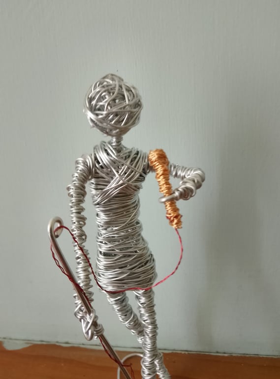 Singer  wire art sculpture  