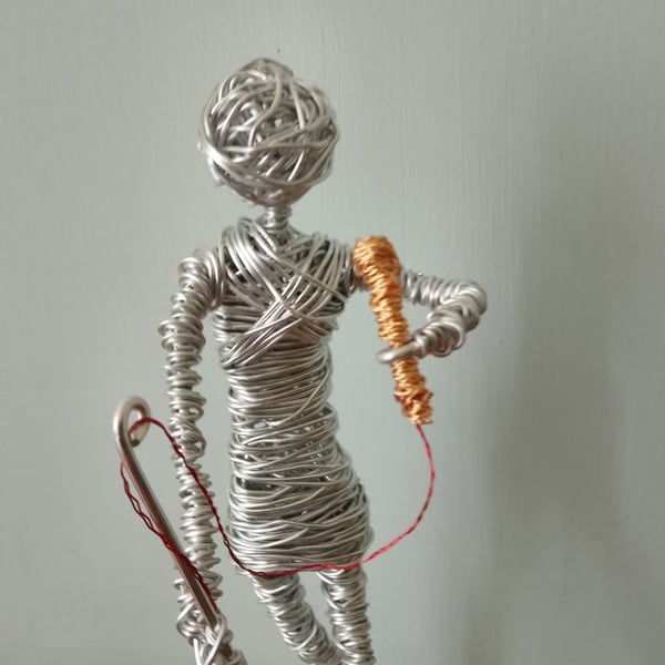 Singer  wire art sculpture  