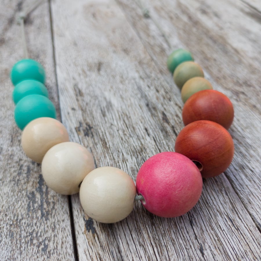 Cora - wooden beaded necklace in turquoise, white, pink and rust