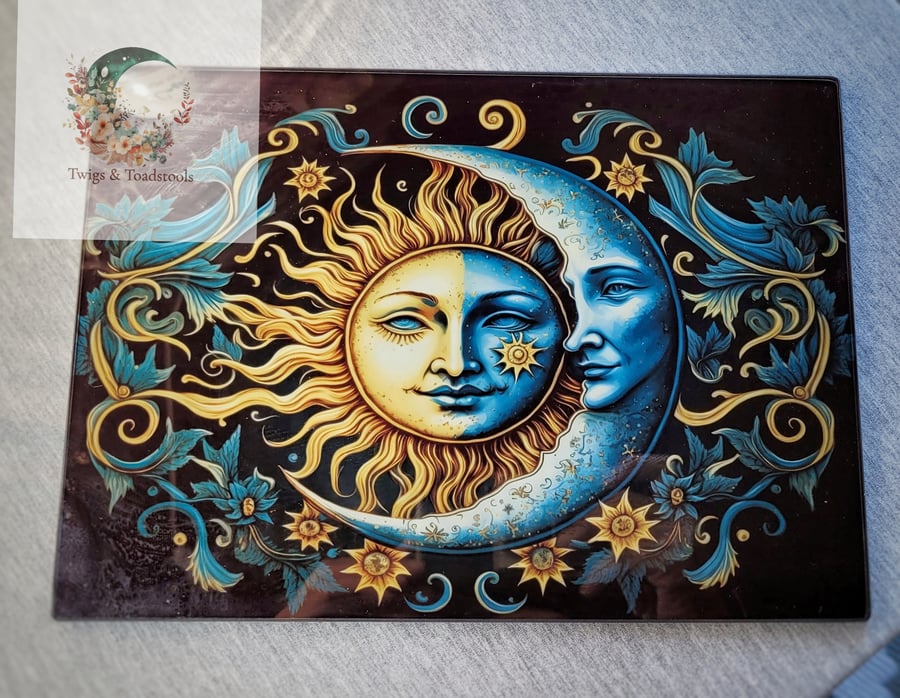 Celestial moon and sun glass chopping board 