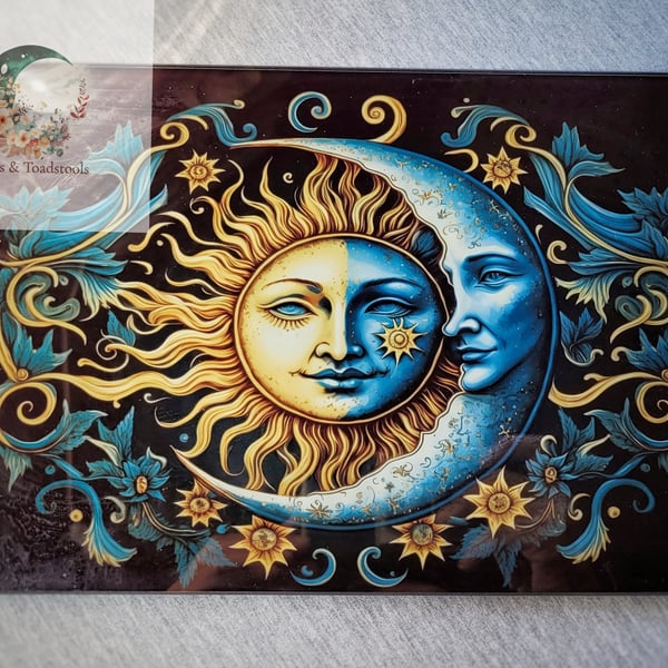 Celestial moon and sun glass chopping board 