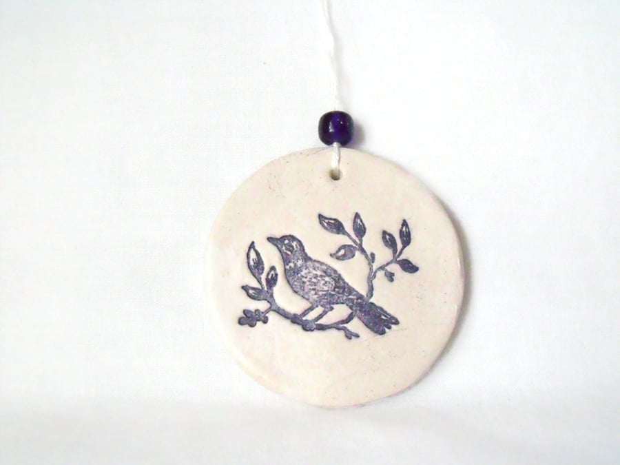 ceramic bird hanging decoration in black and white