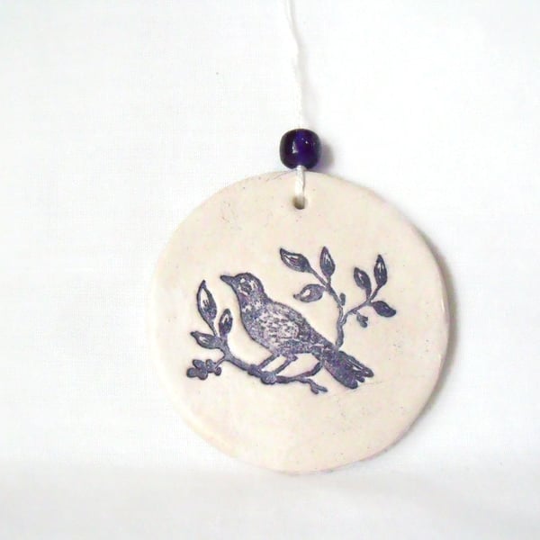 ceramic bird hanging decoration in black and white