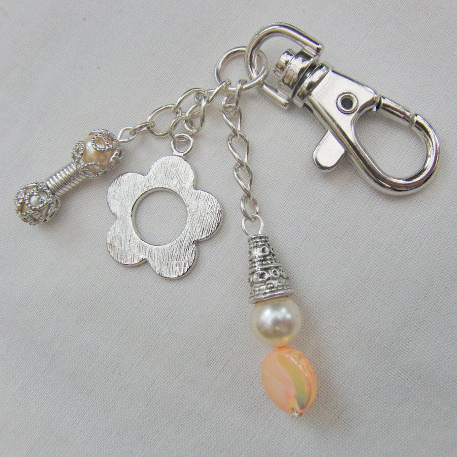 Beaded Bag Charm with Pearl and Mother of Pearl Beads and a Silver Flower Charm