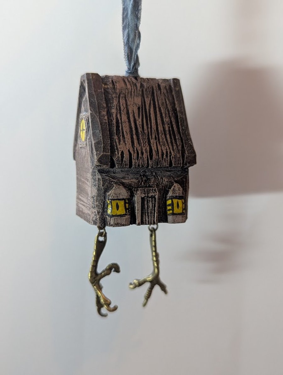 Baba Yaga's Chicken Leg Hut hand carved and painted decoration with dangly legs