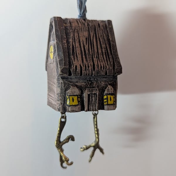 Baba Yaga's Chicken Leg Hut hand carved and painted decoration with dangly legs