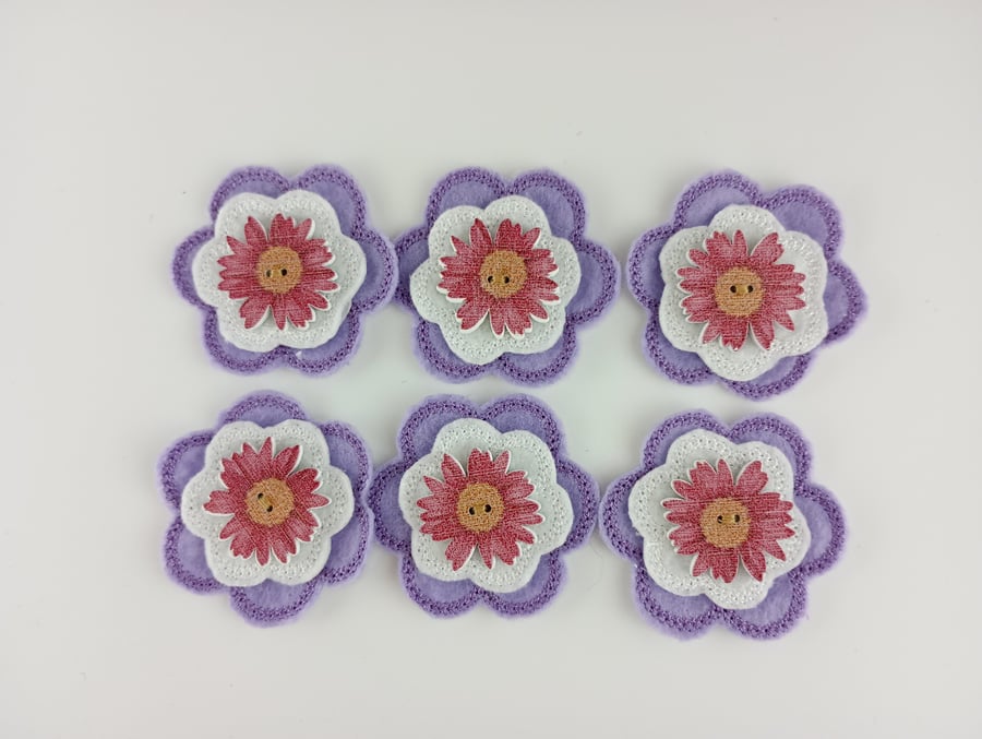 Purple and white felt and wood flowers for embellishment