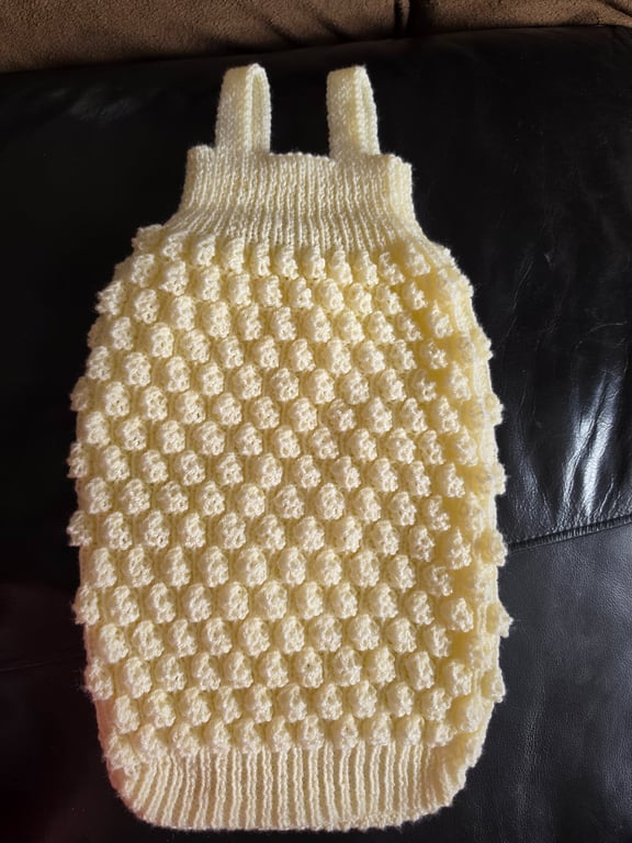 Hand knit sleeveless sleeping bag. 
