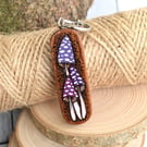 Purple Fungi Foray. Pyrography key ring.