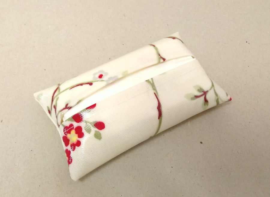Tissue holder in cream with a floral pattern, tissues included, wipe clean