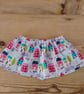 Baby skirt in a bright houses pattern fabric age 9-12 months.