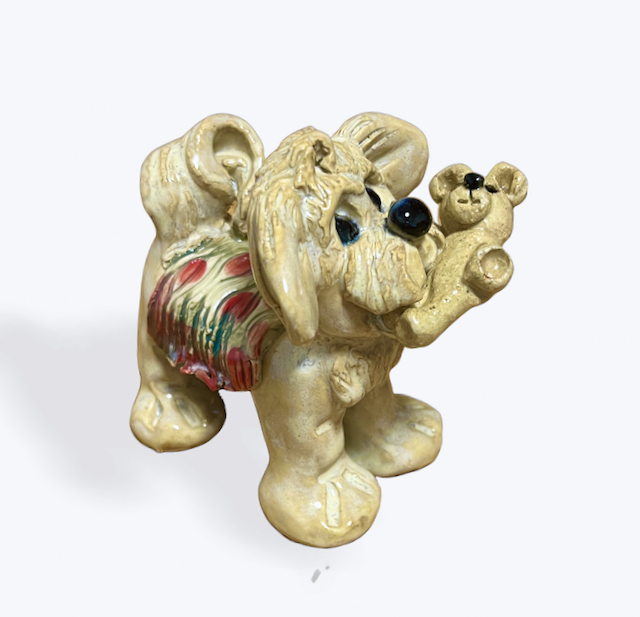 Handcrafted Ceramic Dog carrying his Teddy Bear - just the cutest