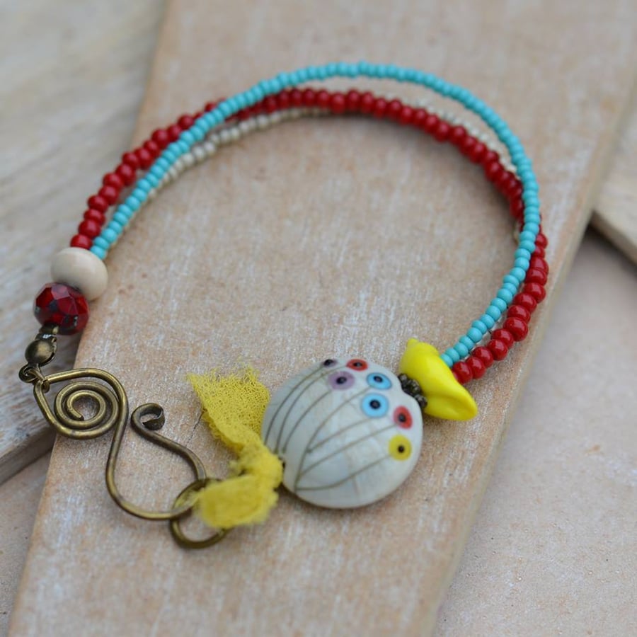 Bracelet with Floral Lampwork Bead, Bird, Seed Beads, Czech Beads & Brass Clasp