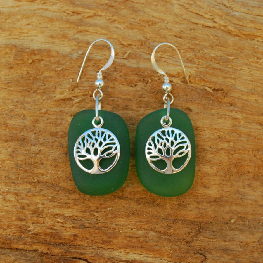 Green beach glass earrings with tree of life charms