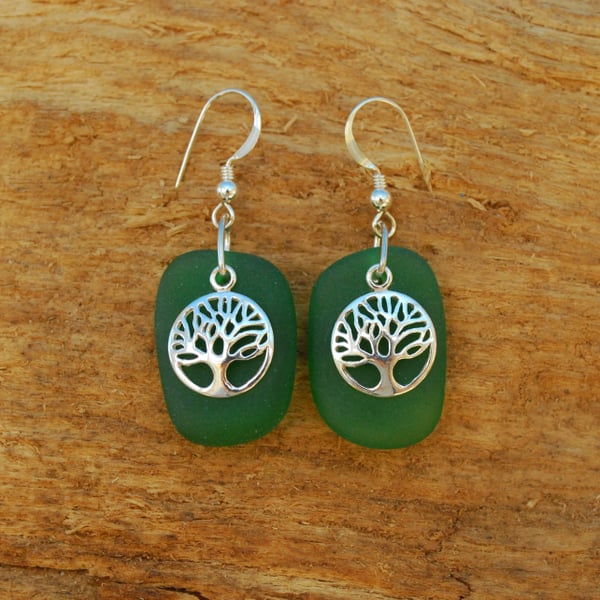 Green beach glass earrings with tree of life charms