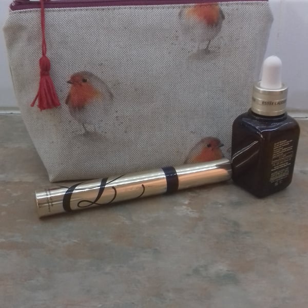 Robin make up bag with red tassel 