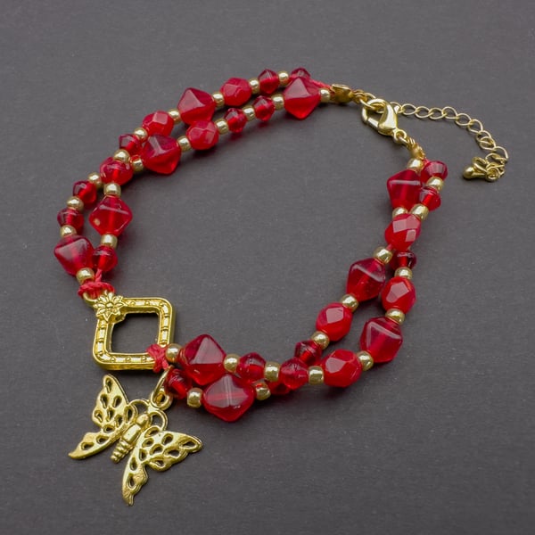 Red and Gold Bead Bracelet with Butterfly Charm