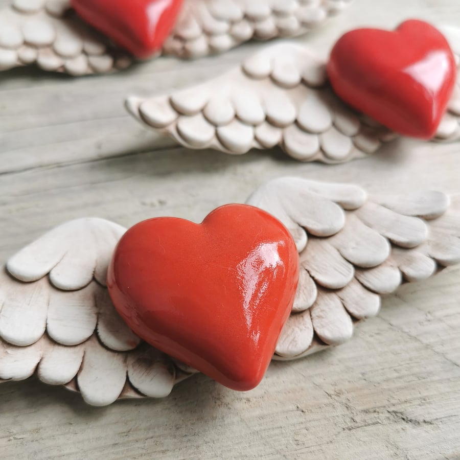 Heart sculpture, ceramic wall art, red ceramic heart with wings, wall art