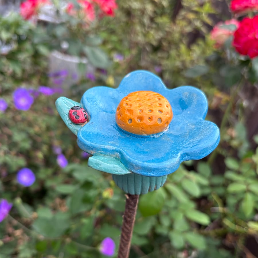Blue and orange Flower cane topper