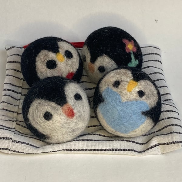 Wool tumble dryer balls. Energy saving and plastic free. Penguins