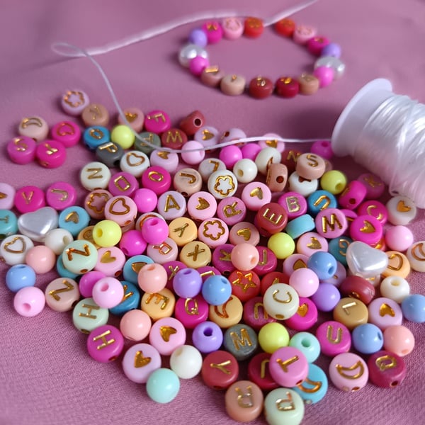Small bracelet making kit including alphabet beads and many decorative beads