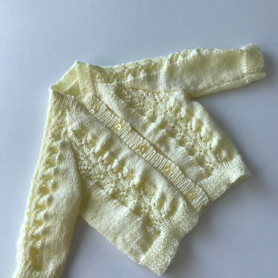  Baby cardigan with lacy panels