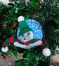 Christmas tree decoration of a Seal, airdry clay with a fabric hat and scarf.   - Image 6