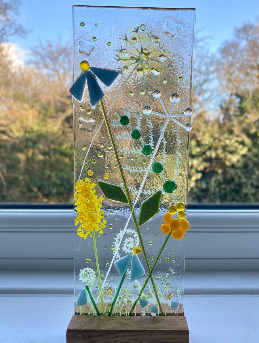 Tall fused glass panel with oak stand