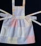 Reversible baby dress in pastel colours including a Laura Ashley print - Image 4