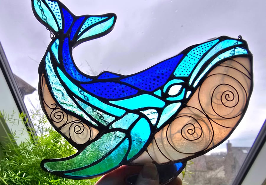 Stained glass whale