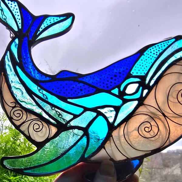 Stained glass whale