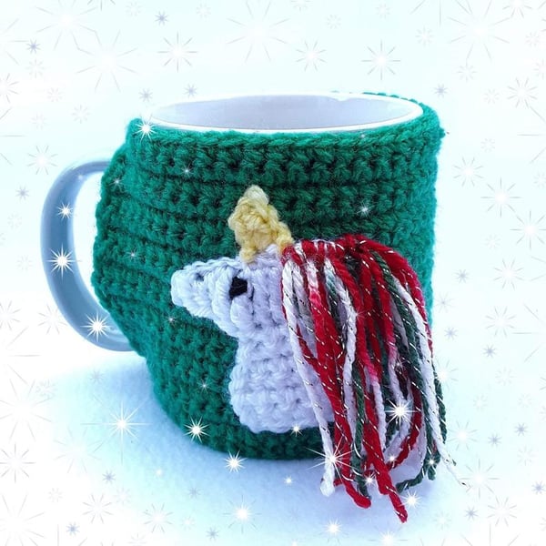 Hand crocheted green Christmas themed unicorn mug cosy with sparky mane 