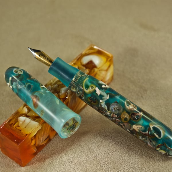 Collectors fountain pen with clam and winkle seashells, made on orkney. SB7