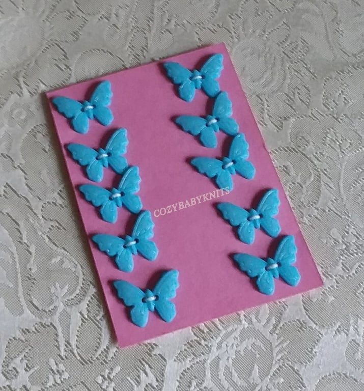 TURQUOISE BUTTERFLY PLASTIC BUTTONS WITH TWO HOLES FOR ATTACHING 