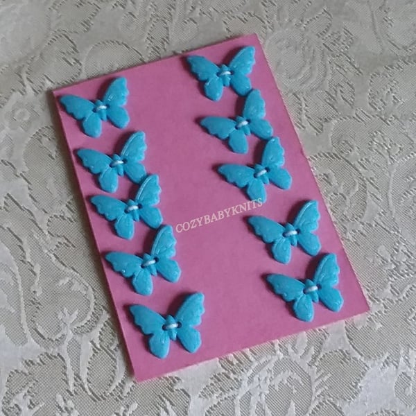 Turquoise butterfly plastic buttons