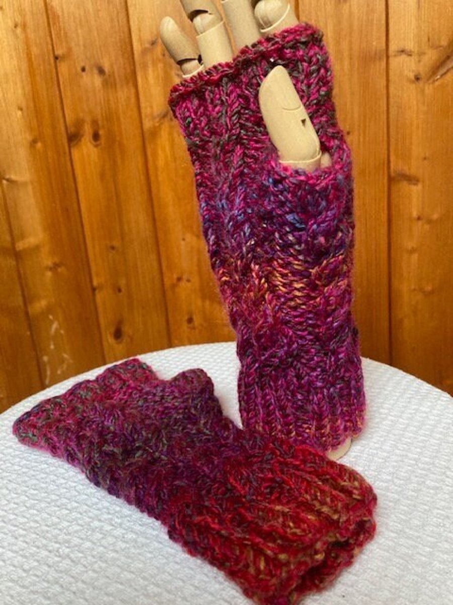 Hand knitted cable stitch fingerless mittens