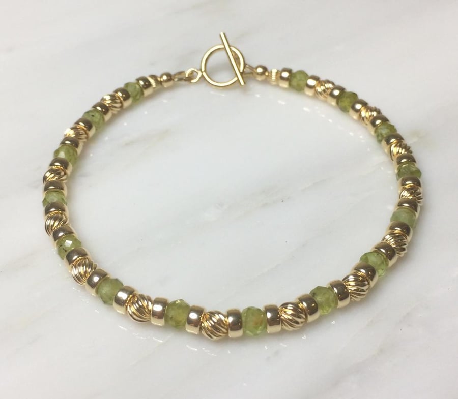 gold and peridot gemstone bracelet