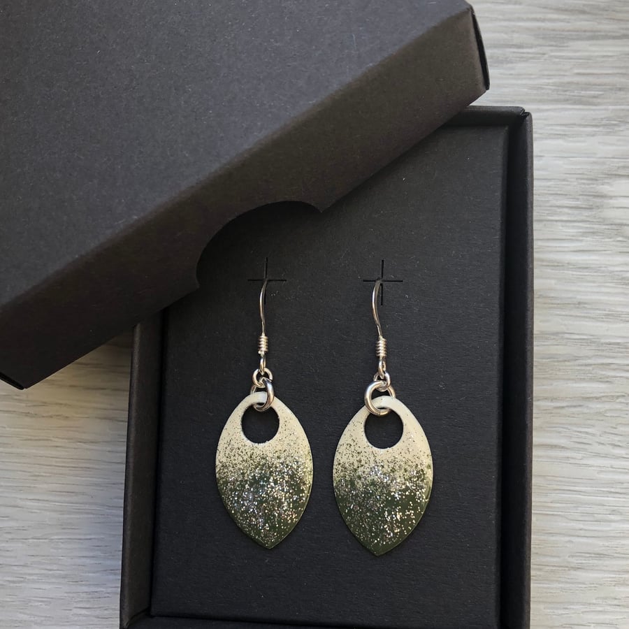 Cream, olive and a touch of glitter enamel scale earrings. Sterling silver. 