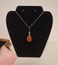 Amber colour resin and sterling silver pendant