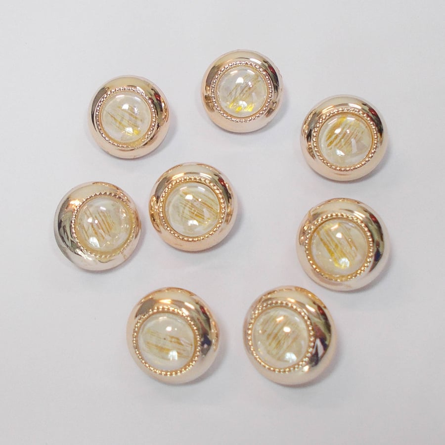 Gold faux metal and glass fancy shank buttons 16mm approximately. Pack of 8