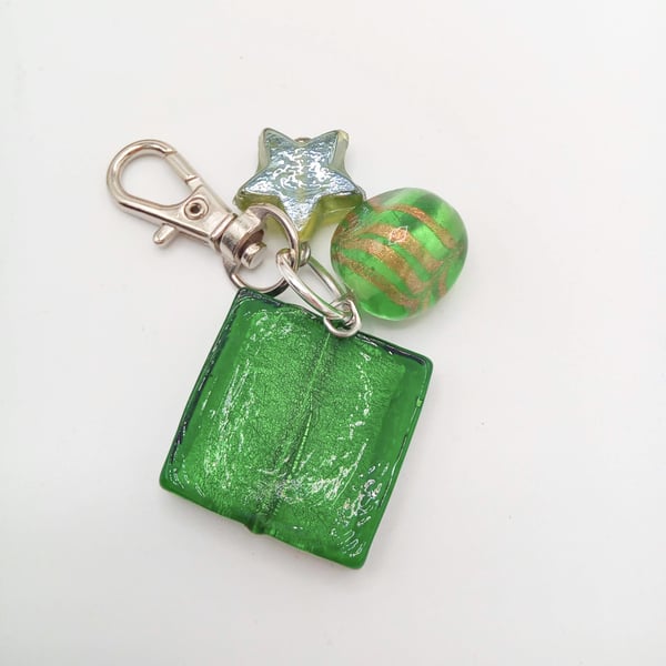 A Green Bag Charm or Keyring with A Star Bead A Pyramid Bead and A Square Bead 