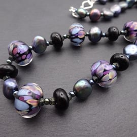 black and purple lampwork glass beaded necklace