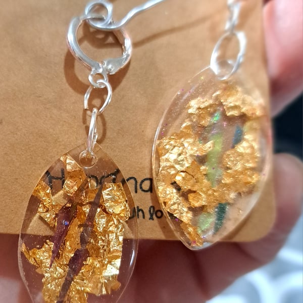 Oval shaped resin earrings with dichroic film and gold leaf