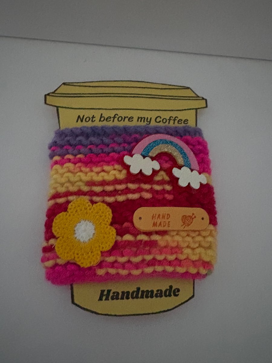 Pride knitted cup cosy. 