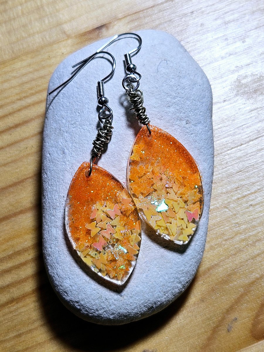 Sparkling earrings made of epoxy resin, earrings for gift in orange colour 