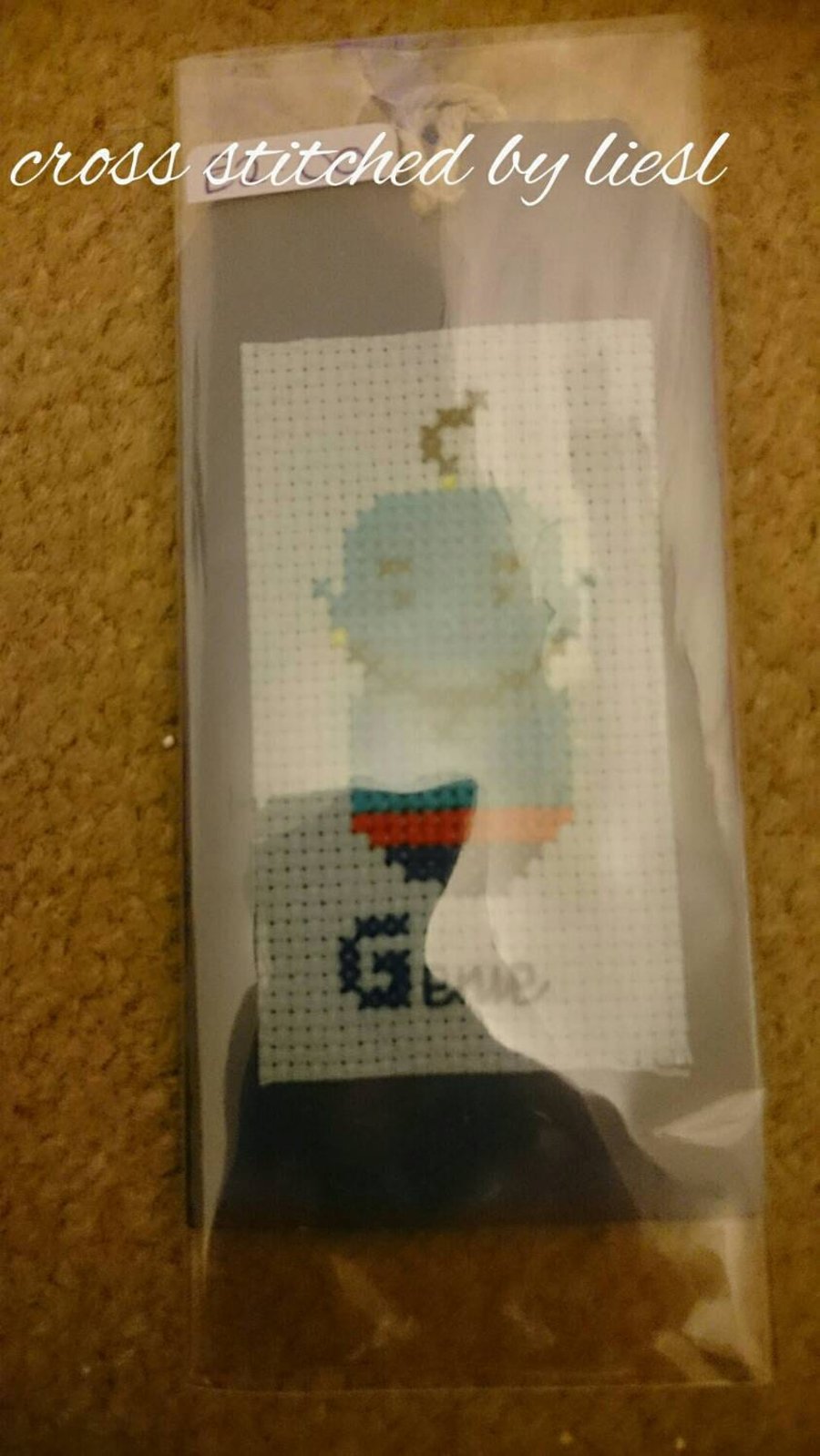 Cute cross stitched genie gift tag. Make that present more special by adding thi