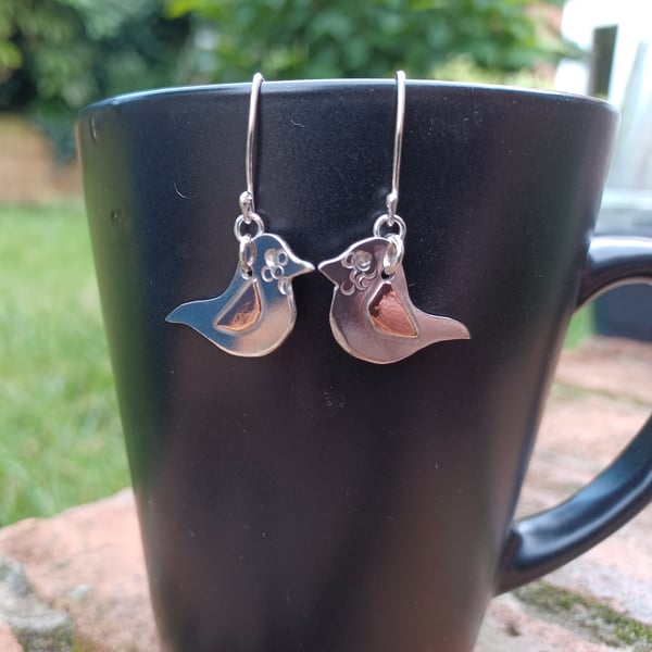 Silver birdie earrings